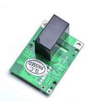 Closeup of a SONOFF 5V relay module PCB with QC Passed sticker, green circuit board