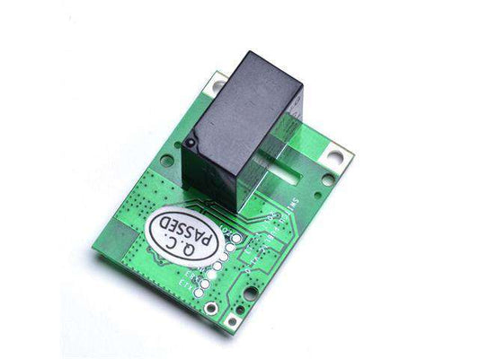Closeup of a SONOFF 5V relay module PCB with QC Passed sticker, green circuit board
