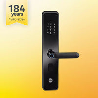 Modern black digital door lock with keypad, biometric sensor, and handle on yellow gradient background.