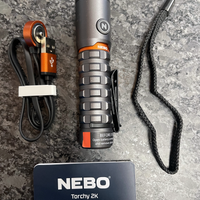 NEBO Torchy 2K flashlight with MagDock charging cable and accessories