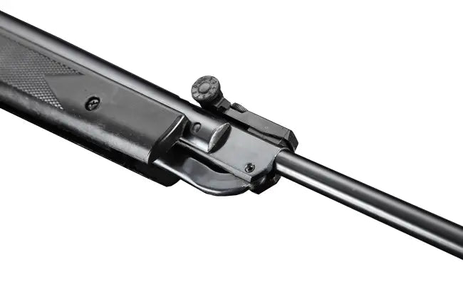 Close-up of black air rifle barrel and rear sight on white background
