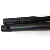 Close-up of Xisico Sentry PCP air rifle barrel with cylindrical metal components.
